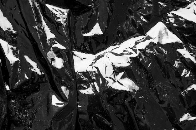 Black transparent plastic film wrap overlay texture background