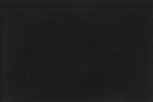 Фото Черный винтажный и старый бумажный фон с гранжевой текстурой
