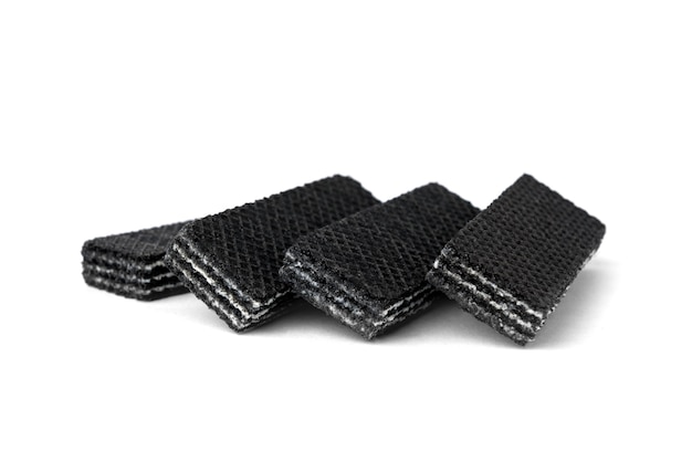 Black wafers isolated on white background.