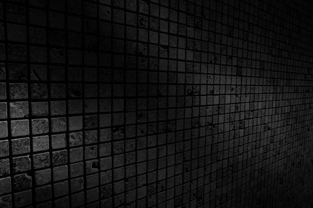 The black wall surface uses a lot of bricks. Or old black brick wall abstract background