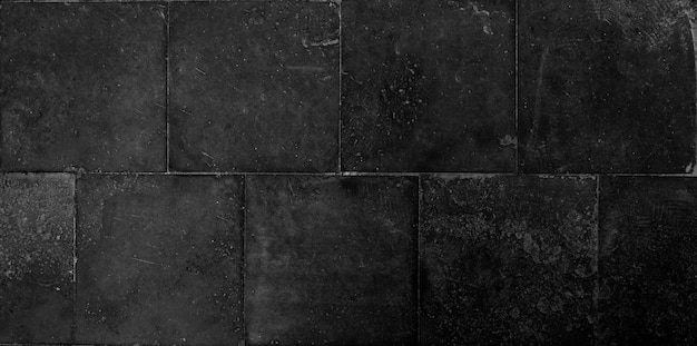 Photo black wall texture with tiles