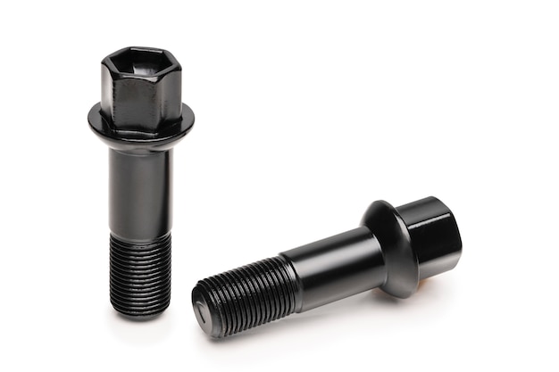 Black wheel bolts, car fasteners. isolate on a white space, close-up