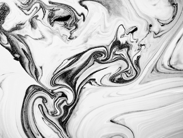 Black and white acrylic paint texture with abstract organic shapes