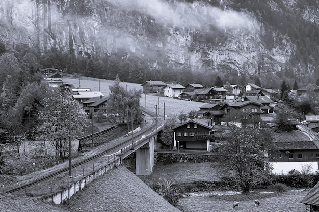 Black and White Architecture Buildings with the mist in Lauterbrunnen.