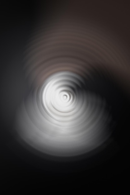 black and white background with circular waves