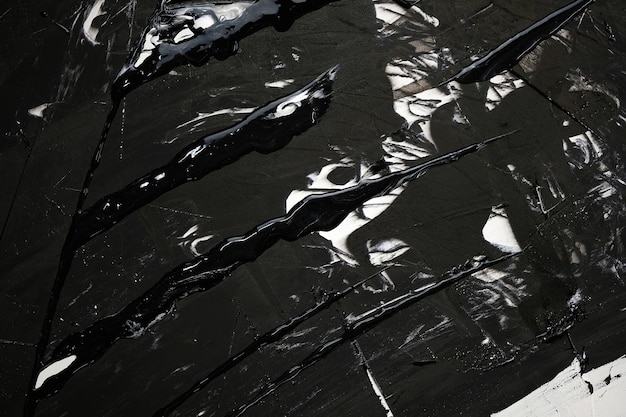 Black-white background with smudges and splashes of paint