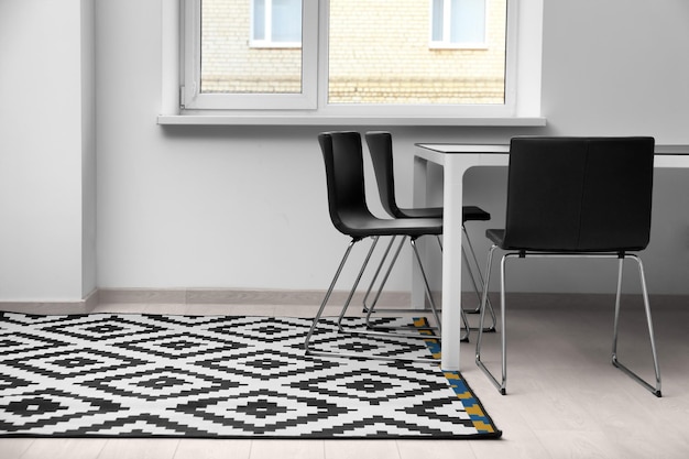 Black and white carpet on floor indoors