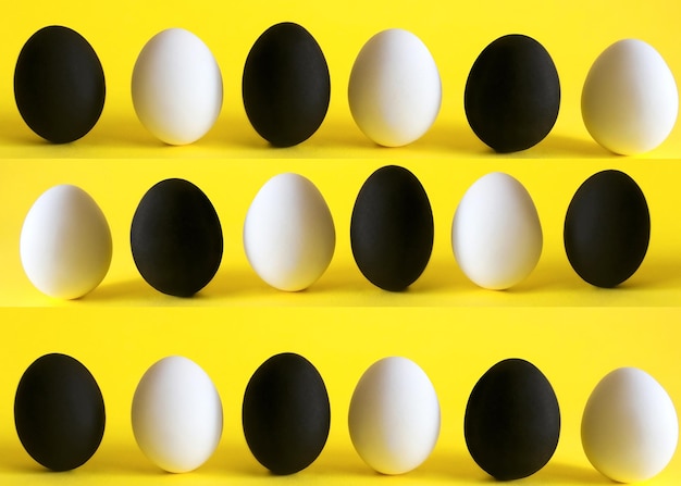 Black and white eggs on the yellow background