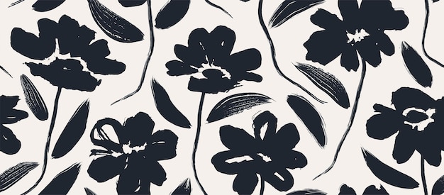 A black and white floral pattern with a leaf and flowers