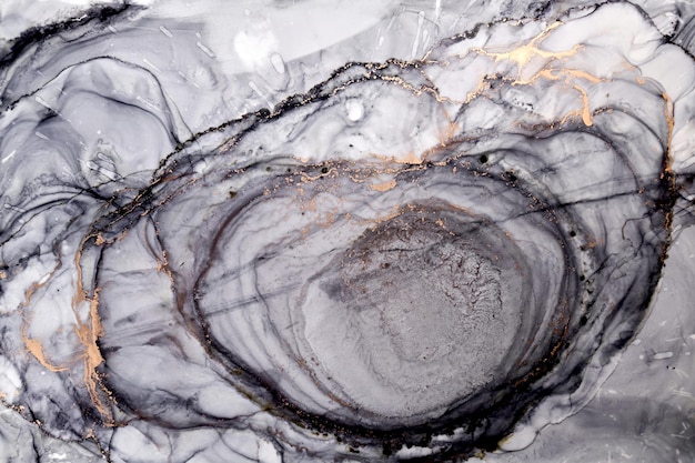ブラックホワイトゴールドインク高級背景大理石テクスチャ流体アートペイントミックス水中スポット汚れ