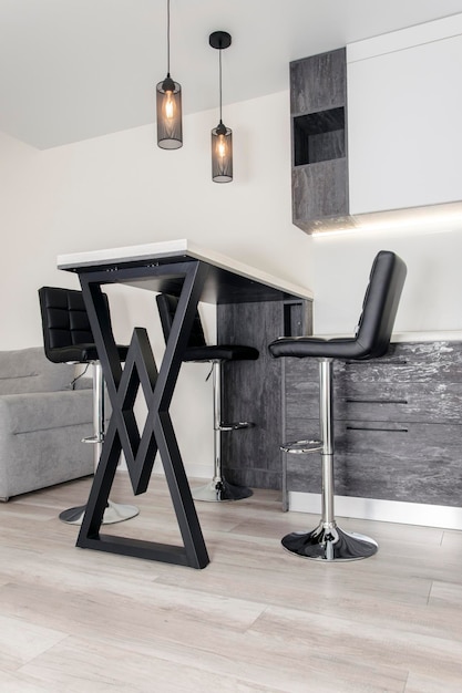 Black and white kitchen with bar