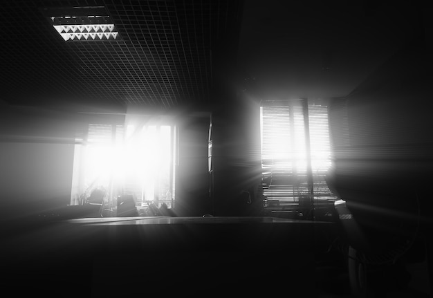 Black and white office during sunset background