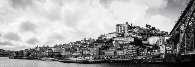 Black and white panoramic view of porto city and douro river from vila nova de gaia