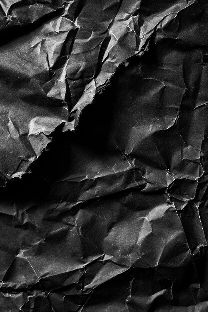 Photo a black and white photo of a crumpled piece of paper