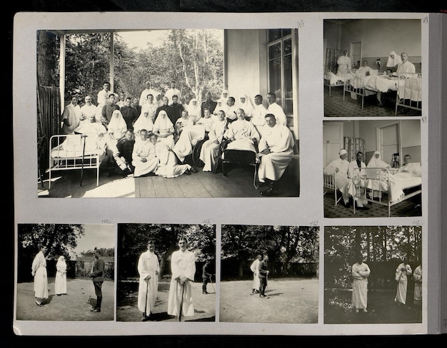 a black and white photo of a group of people with a group of women in white uniforms