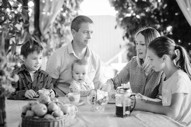 Black and white photos of a home family tea party 3467