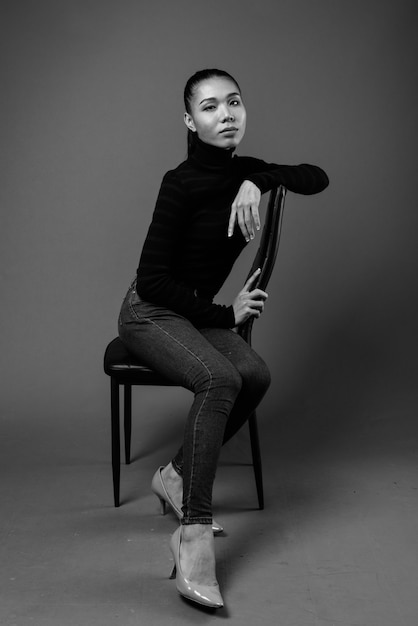 Black And White Portrait Of Asian Transgender Woman Sitting