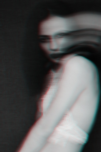 Black and white portrait of a girl with blur and glitch effect