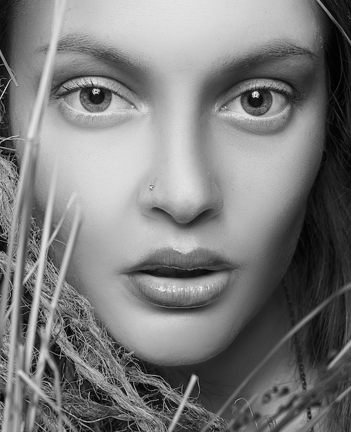 Black and white portrait of a girl with expressive eyes