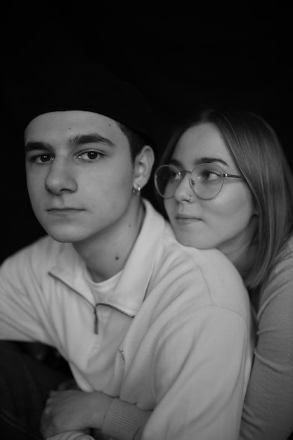 black and white portrait of a loving couple closeup on a black background Couple in love