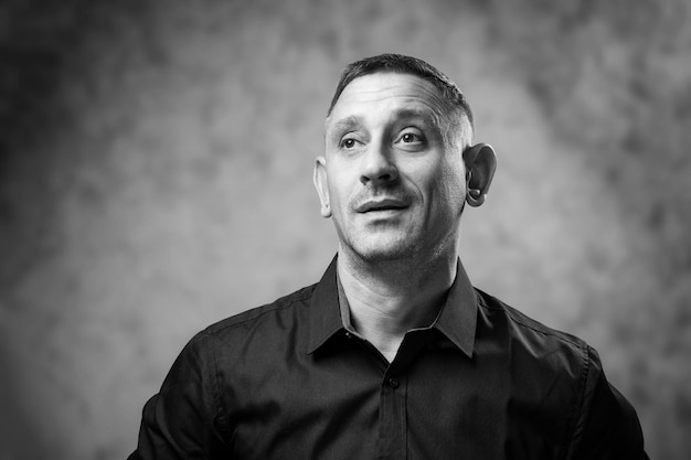 Black and white portrait of a man in a shirt