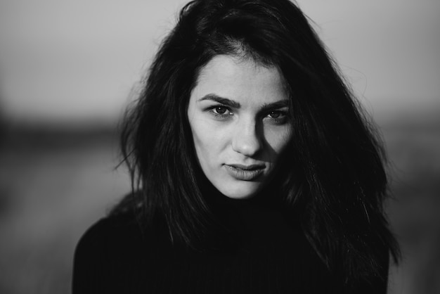 Black and white portrait of a young girl Caucasian brunette girl