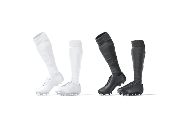 Photo black and white soccer boots with socks tiptoe. sport gaiters and snickers. leggings and shoes.