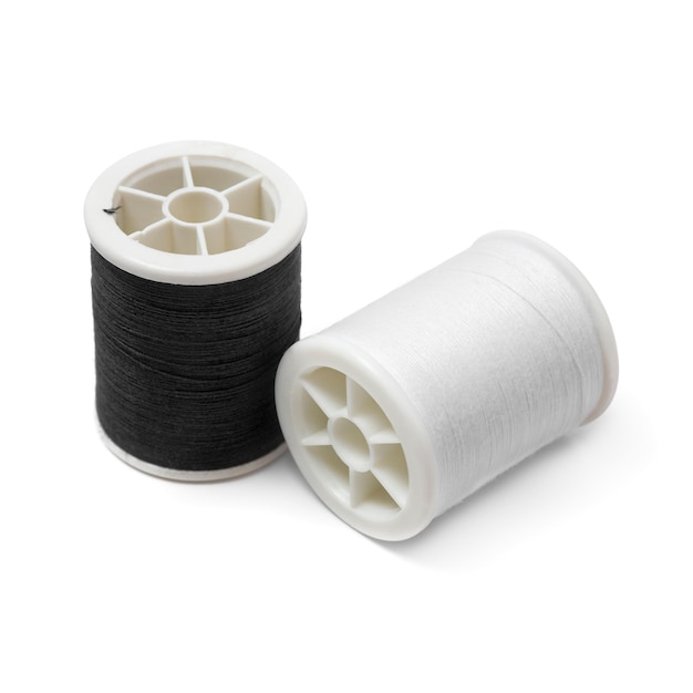 Black and white spools of thread