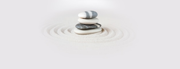 Black and white stones in the sand