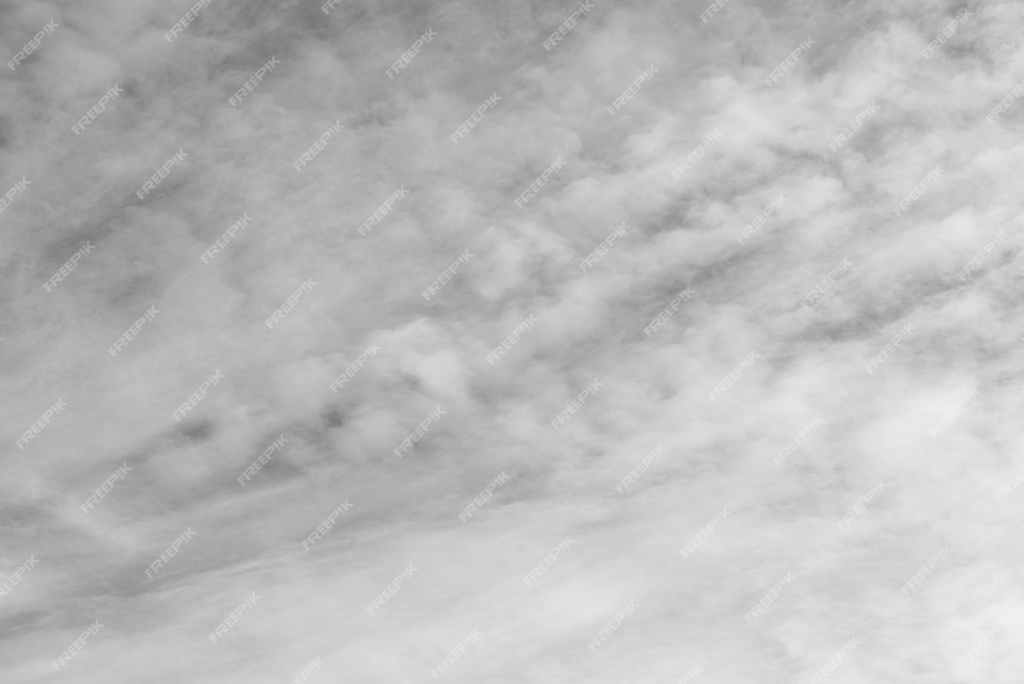 Premium Photo | Black and white texture background in the form of blue sky  and white clouds