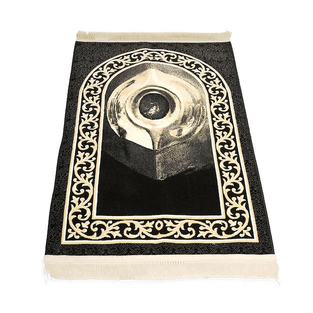 A black and white towel with a gold design on it