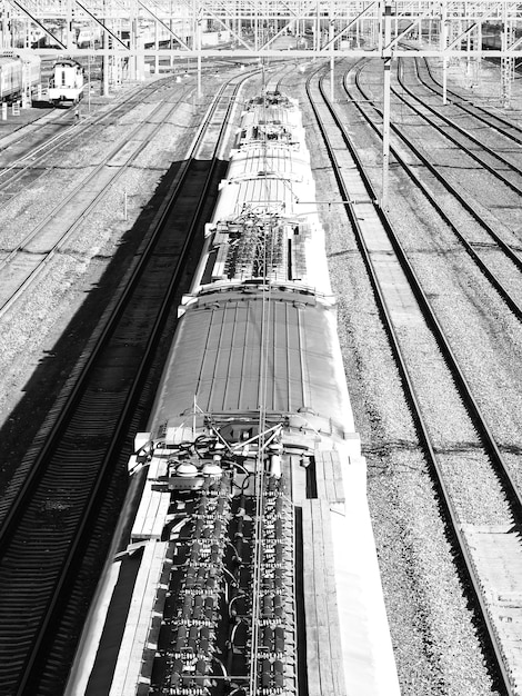 Black &amp; white train carriage from above background