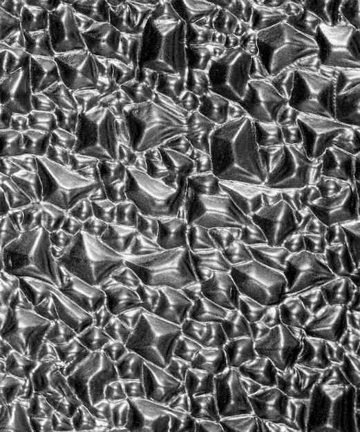 Black and white urban metal texture background grainy closeup macro