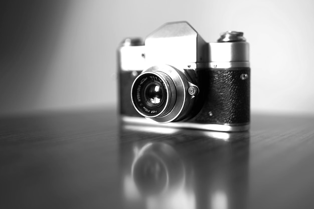 Black and white vintage camera vignette bokeh background