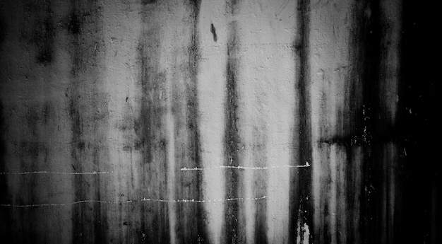 Black and white wall with a white stripe in the middle.