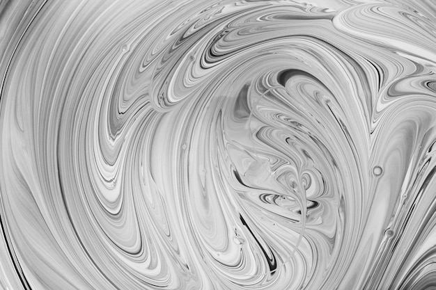 Black and white waves on gray fusion of colors Fluid Art Abstract marble background or texture