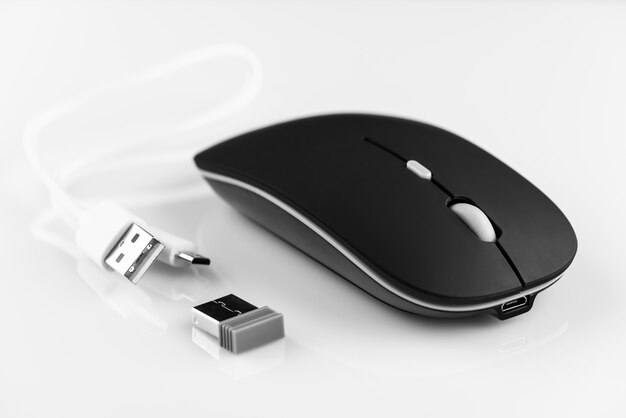 Photo black wireless computer mouse on a white.