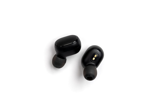 Black wireless headphones isolated on white background.