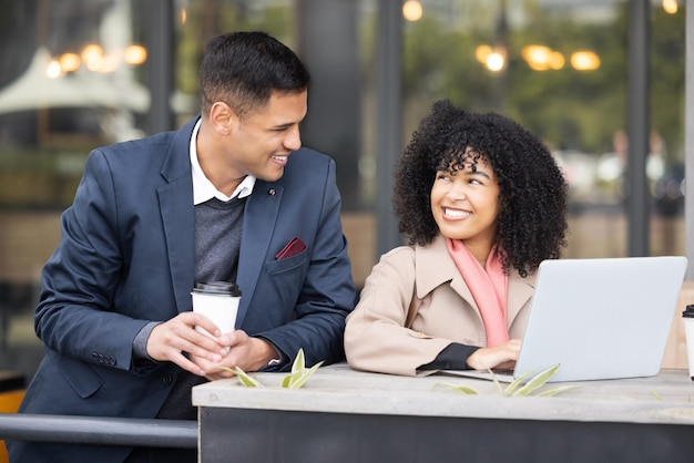 Black woman businessman and cafe meeting with laptop schedule planning and strategy for success Man coffee shop and working partnership collaboration or happiness for financial solution business