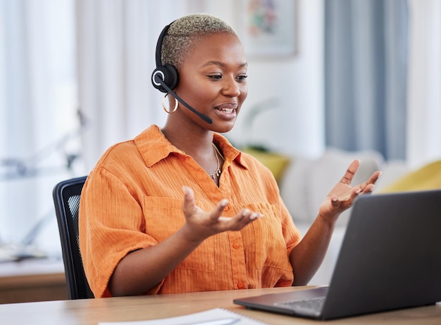 Photo black woman call center and consulting on laptop in customer service support or telemarketing at home african freelance person or consultant agent talking on computer with headset in online advice