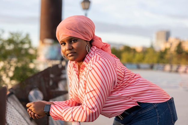 Black woman cancer scarf serious