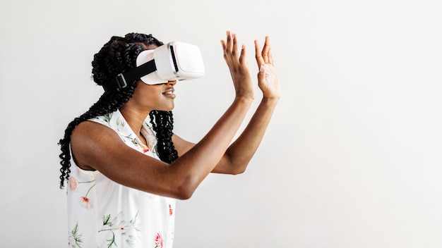 Black woman enjoying a VR headset social template