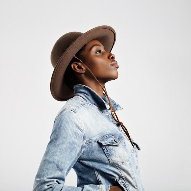 Black woman in hat in profile