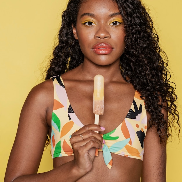 Black woman having an ice pop ice cream