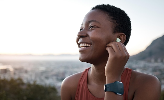 Black woman laughing face or fitness earphones in sunset workout healthcare training or cardiovascular exercise in sunrise wellness Zoom happy smile or sports runner listening to motivation music