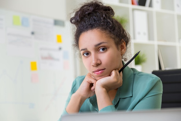 Black woman portrait in office