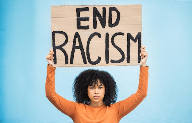 black woman protest poster and anger at racism fight for equality human rights and freedom isolated on blue background global problem social justice and revolution angry in studio and politics