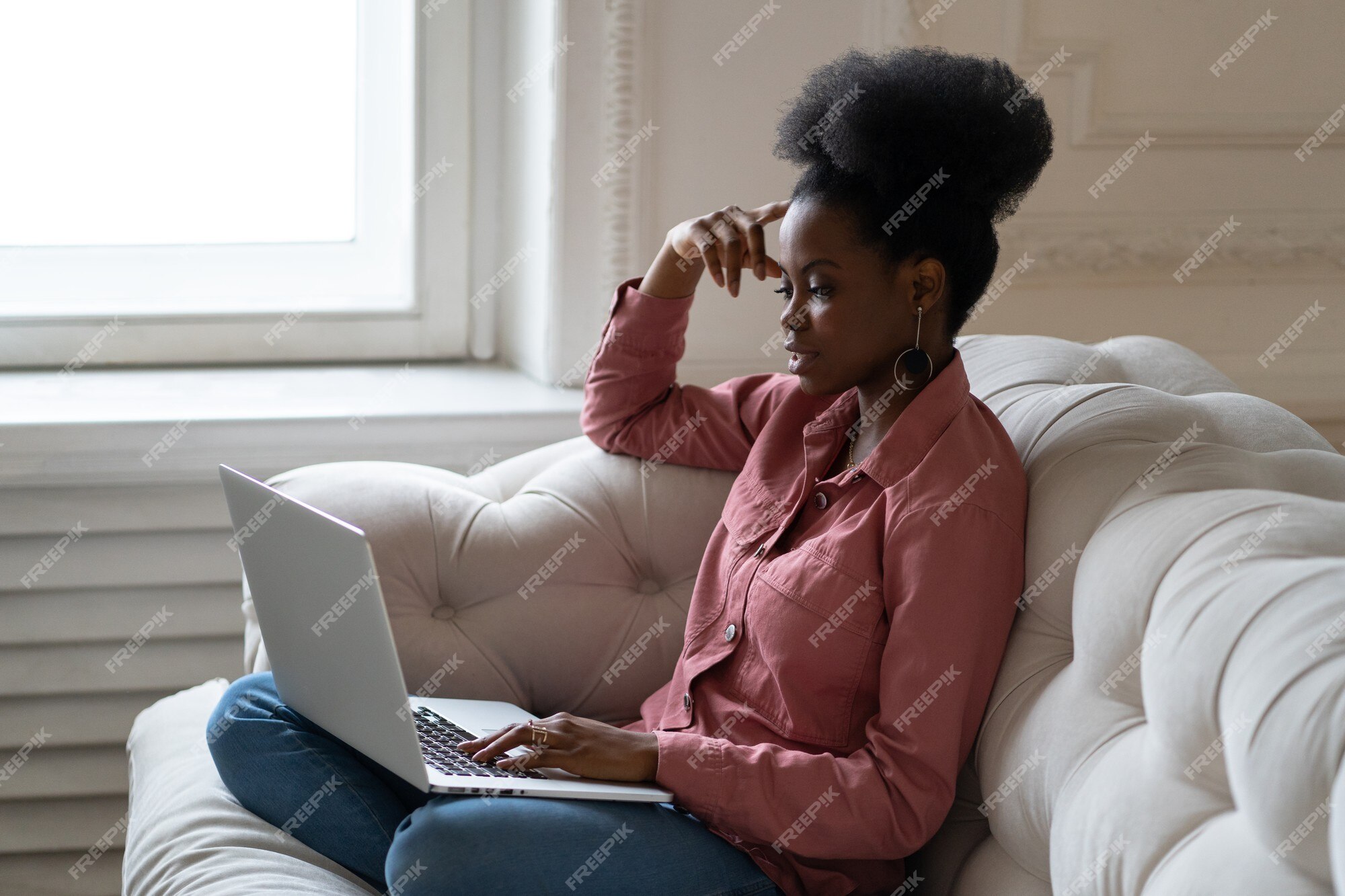 African girl friends chat online. Girl sitting in a chair in front of a  laptop and speaks with friend. Video conference, online chat concept.  Working or online meeting from home. Vector illustration.