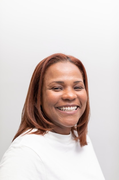 A black woman smiling at the dental clinic