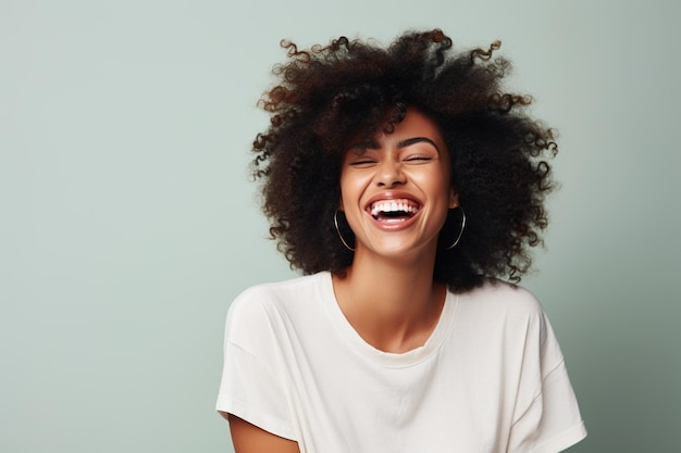 Black woman smiling in a studio